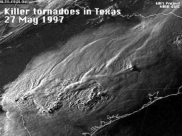 GOES-8 image of the storm front containing a line of killer tornadoes in a weather front crossing Texas on May 27, 1997.